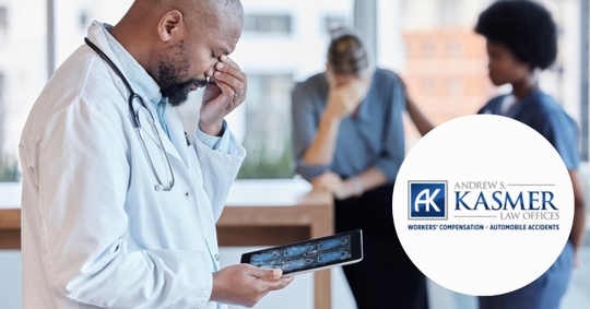 doctor looks down in frustration