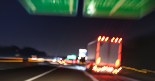 Defocused blurred motion of an impaired driver after attending a holiday party.